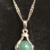 Hands Holding Earth Stone Necklace Blue/Green